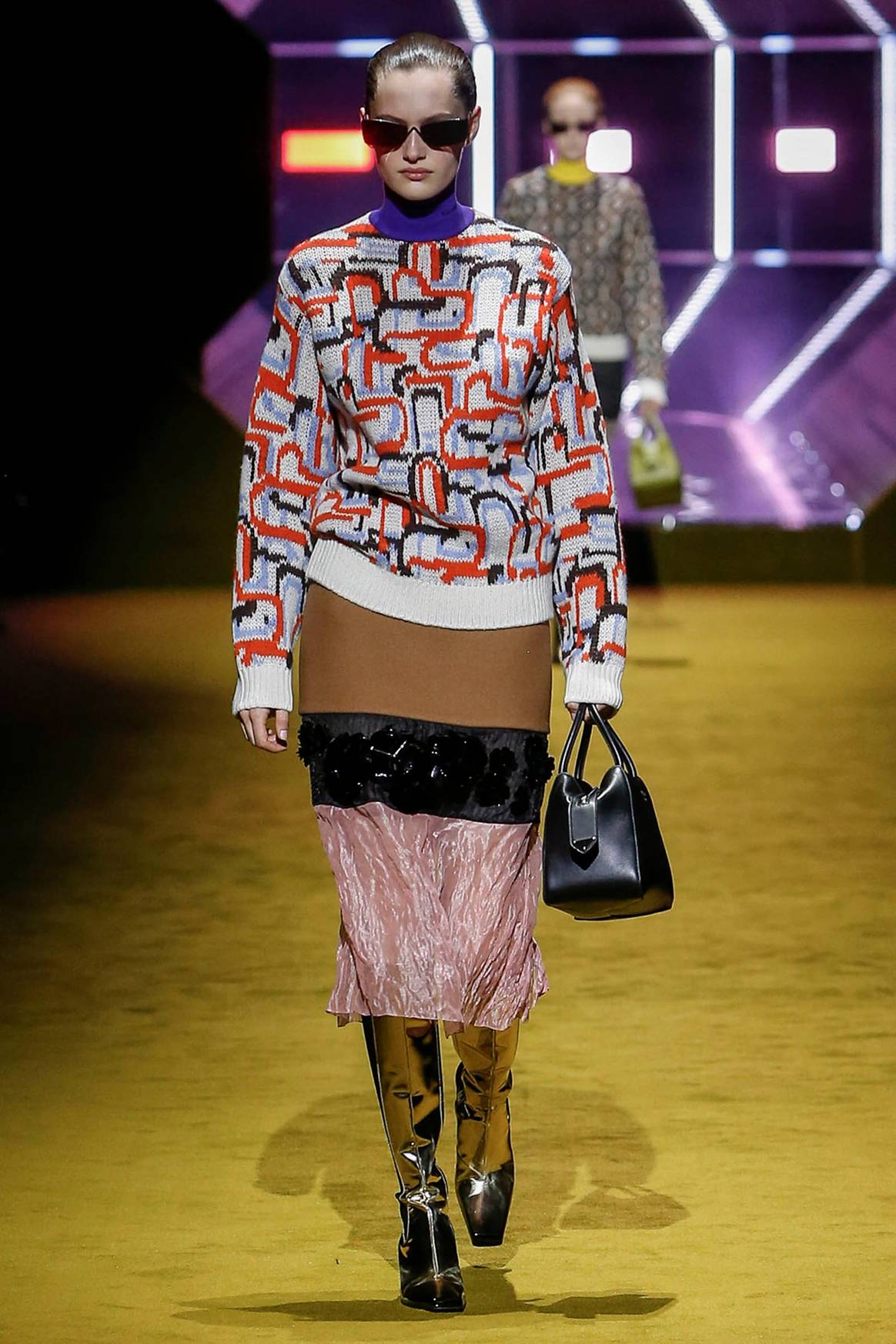 Photo Credits: Prada, colección para mujer para la temporada Otoño/Invierno FW 2022 Womesnwear. Prada, página oficial.